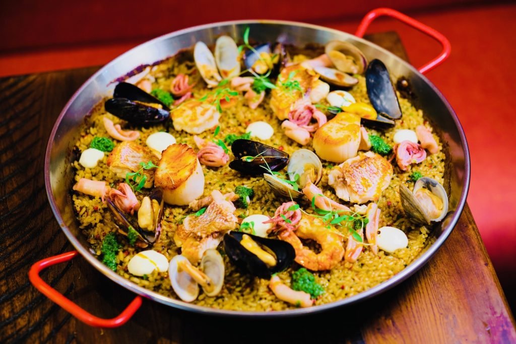 Paella with clams, mussels, prawns and scallops