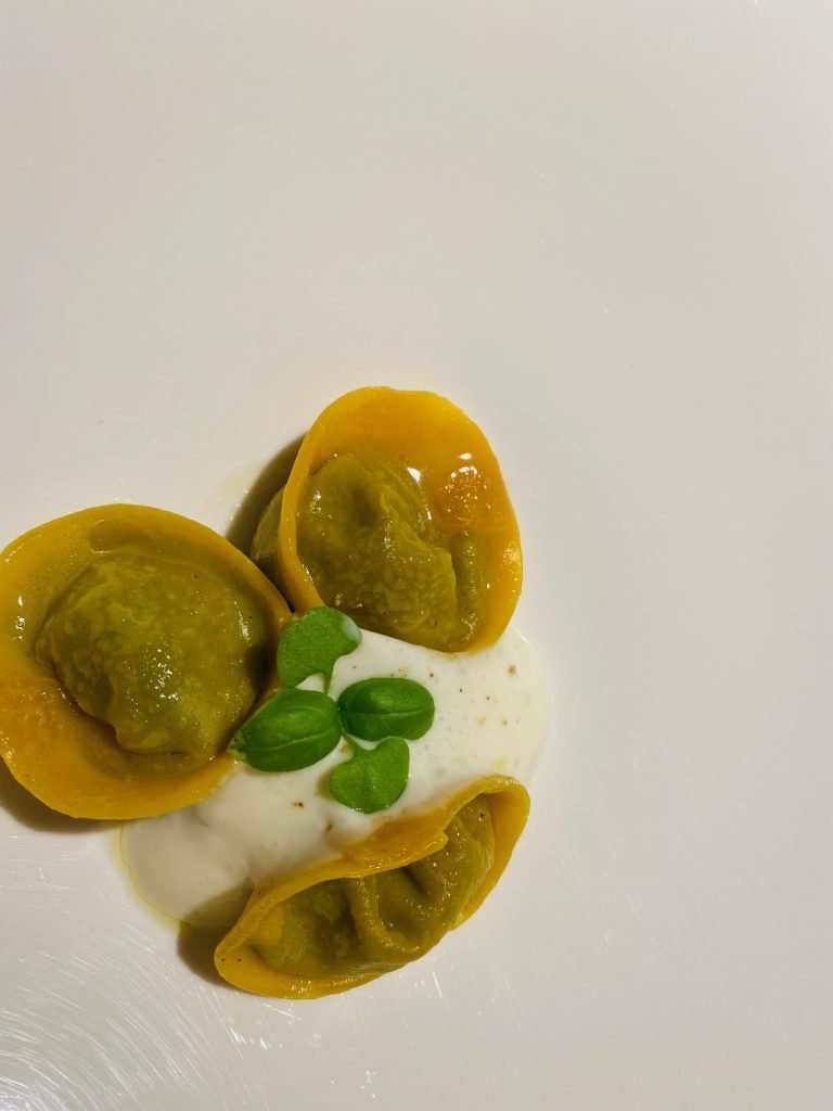 Hand-made green ravioli in brown butter